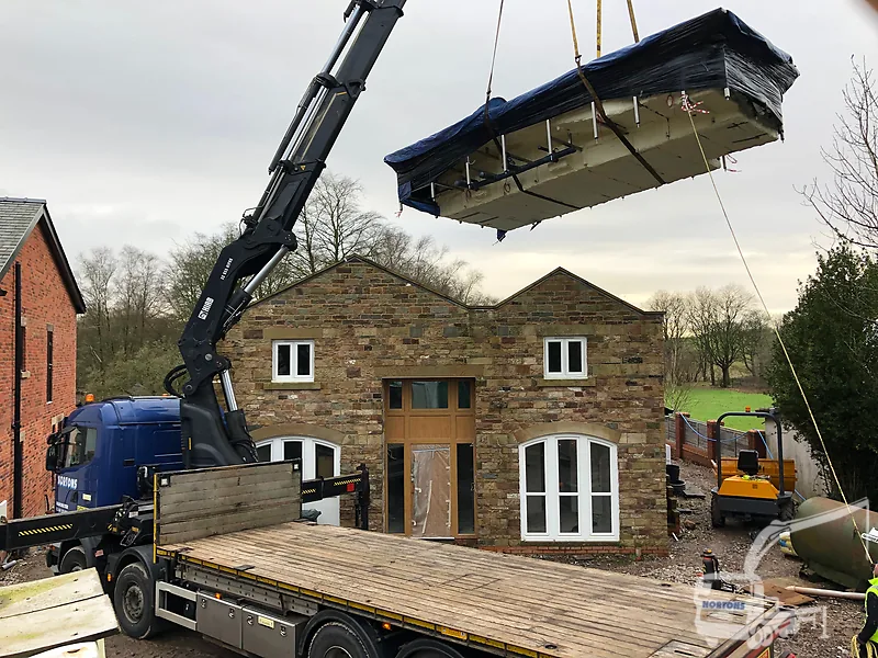 Hiab hire Bristol - hiab lorry delivering a cabin to a South West site