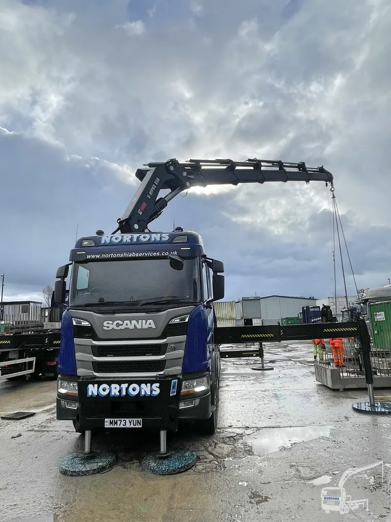 Hiab hire with driver - trained operator controlling a precision lift