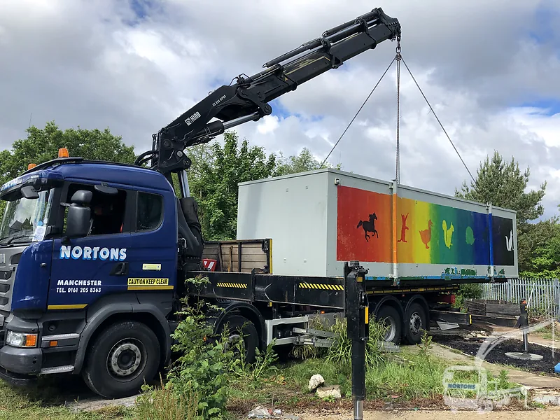 Hiab lorry lifting modular units on a Birmingham site